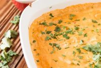 Cheesy Chicken Queso Dip with Tortilla Chips receita? Wait user Spanish? Original English. Need English. Keep under 65, natural, clickable, avoid words easy/best/healthy. Also avoid special chars. Use Tortilla Queso. Maybe Chicken Queso Dip with Tortilla Chips That’s repetitive cheesy. Must be fluent. Cheesy Chicken Queso Dip with Tortilla Chips contains Cheesy prohibited? They only said avoid general terms like easy,best,healthy. Cheesy allowed. Keep under 65. Good.