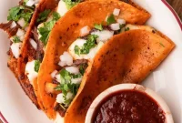 Authentic Birria Tacos: Melted Cheese & Broth Dip Recipe