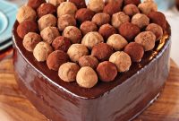 Decadent Heart-Shaped Cake Topped with Chocolate Truffles