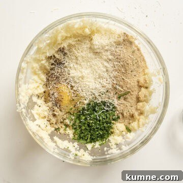 Egg, breadcrumbs, parmesan, parsley, salt, and pepper combined with mashed cauliflower.