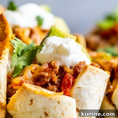 Strait on shot of taco cup on gray platter.