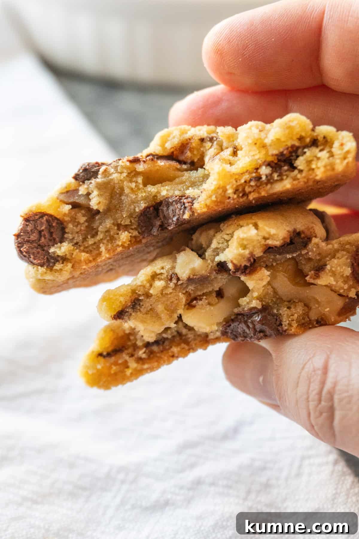 walnut chocolate chip cookie broken in half
