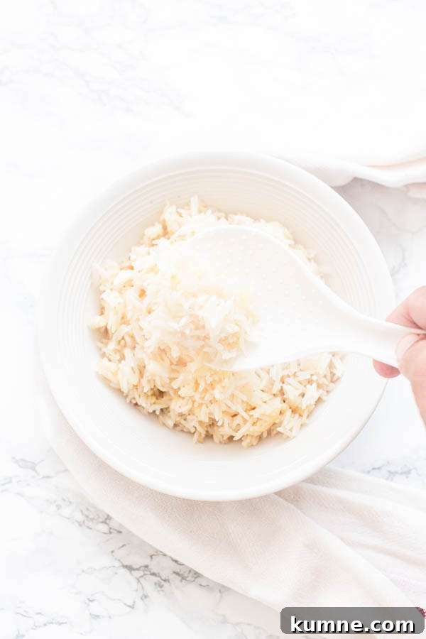 Flavorful Instant Pot Garlic Rice Recipe for Quick Weeknight Meals 7 Instant Pot garlic rice in a white bowl