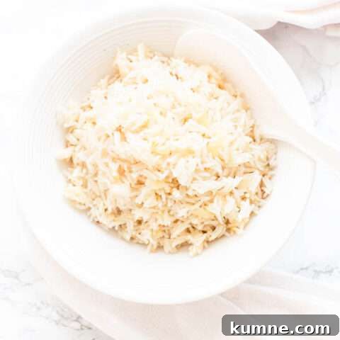 Instant Pot garlic rice in a white bowl