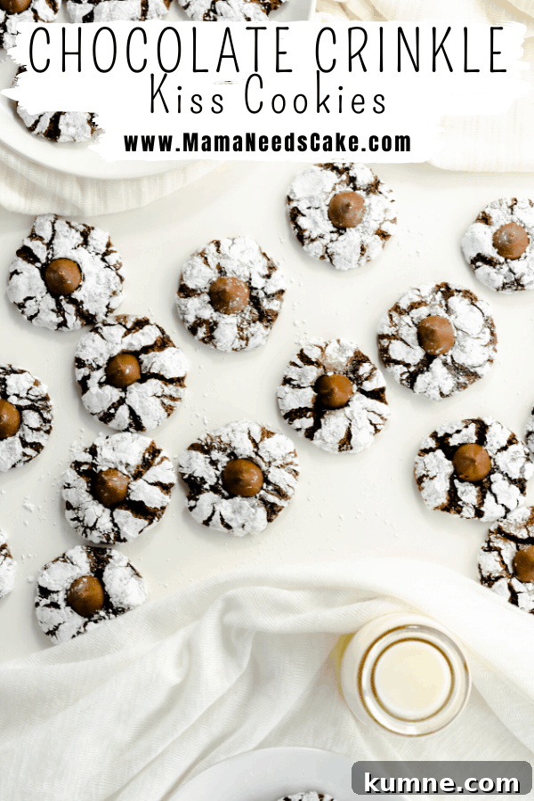 These Chocolate Crinkle Cookies have a soft and fudgy center, are rolled in powdered sugar and have a candy kiss pressed into the center when they're hot out of the oven.