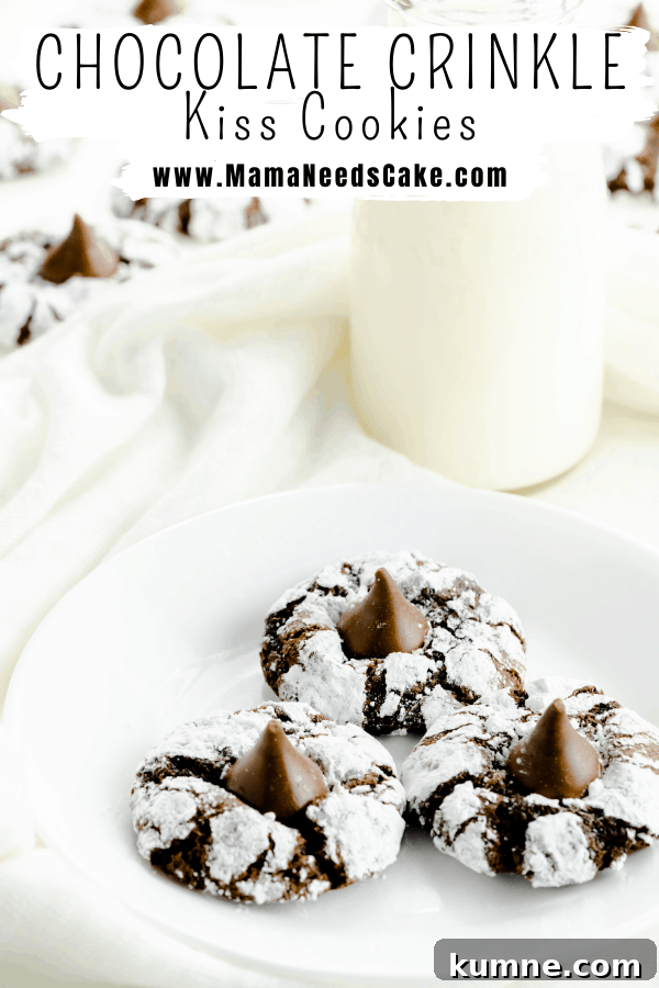 These Chocolate Crinkle Cookies have a soft and fudgy center, are rolled in powdered sugar and have a candy kiss pressed into the center when they're hot out of the oven.