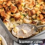 A cropped square image of Amish turkey stuffing recipe, with a spoon resting.