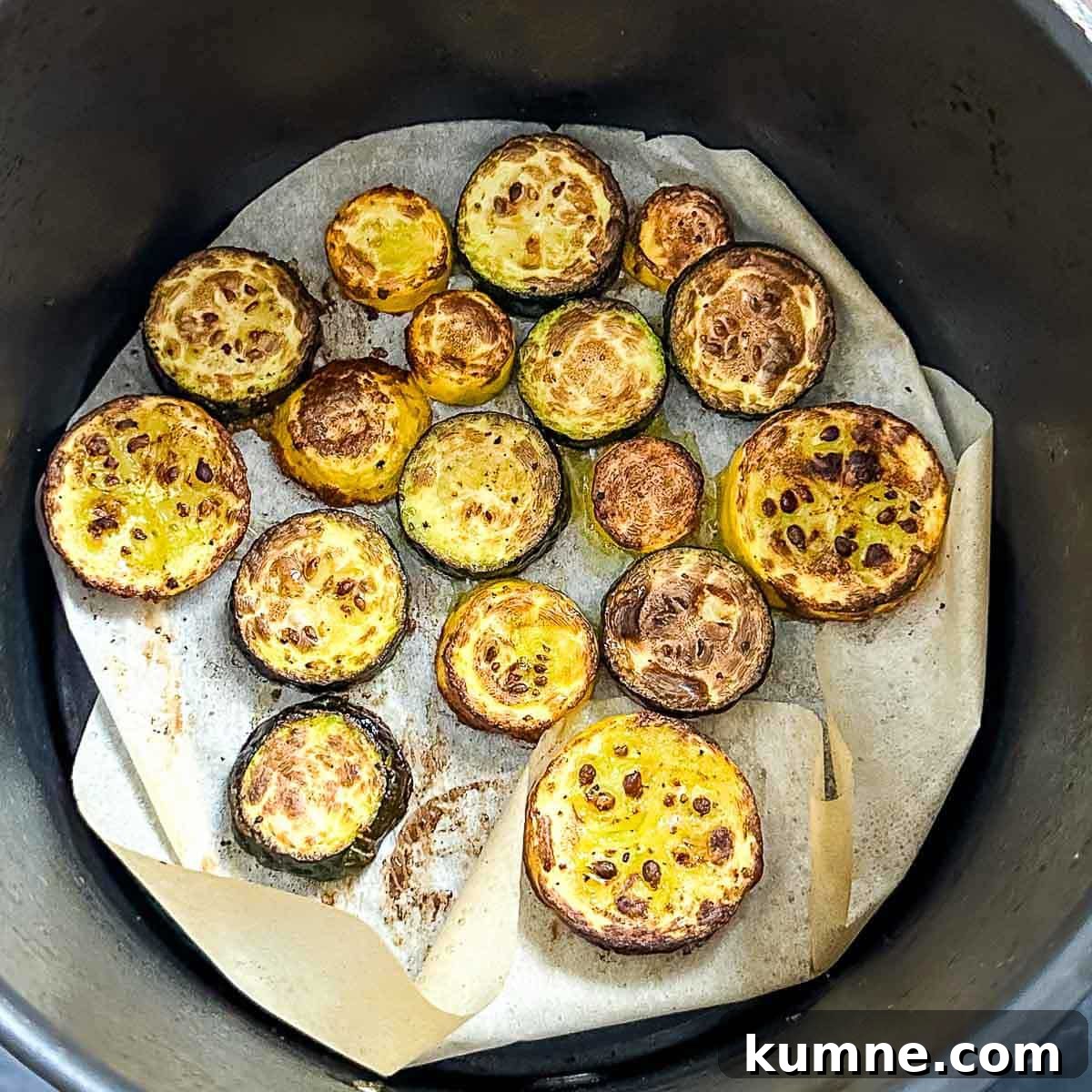 Air fryer zucchini and squash after cooking for 8 minutes in the air fryer basket.