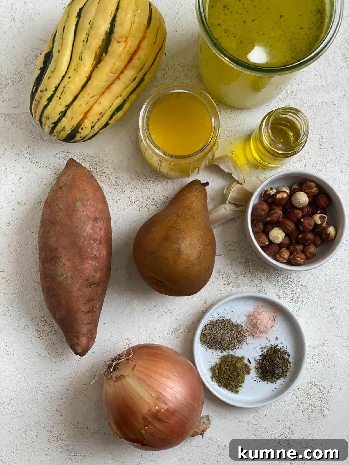 ingredients for Roasted Delicata Squash and Sweet Potato Soup against a light surface