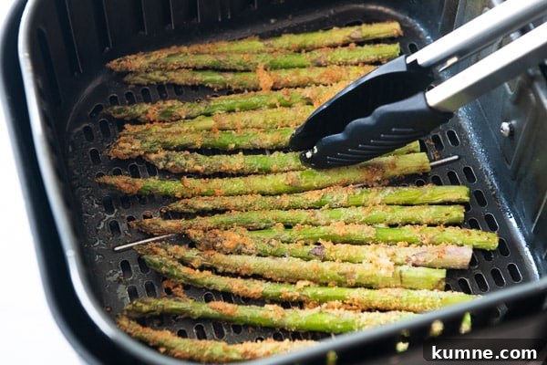 Crispy Keto Air Fryer Asparagus Recipe 8 Turning asparagus
