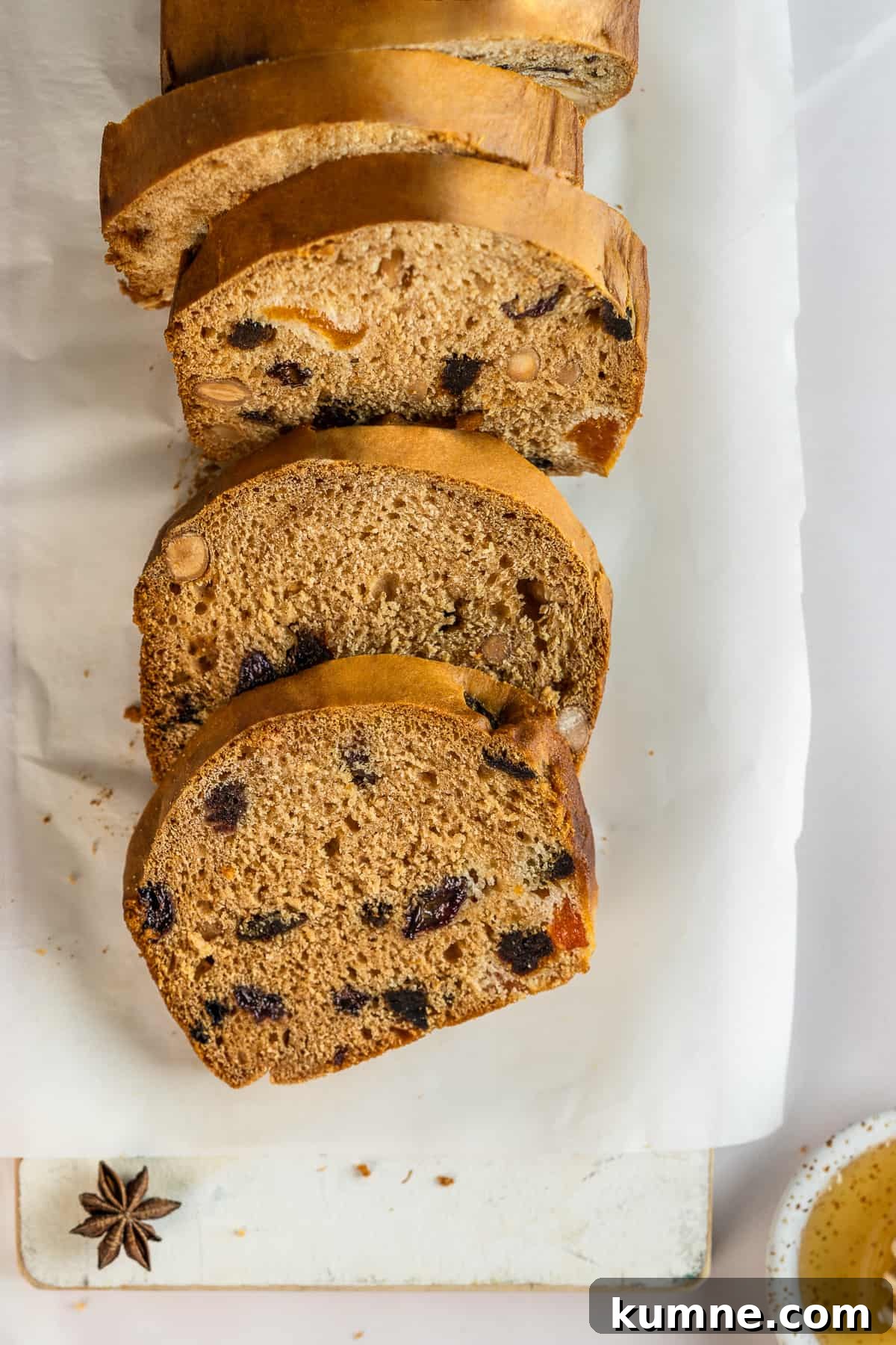 Sliced pain d'epices on parchment paper .