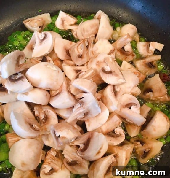 Crispy Fresh Green Bean Casserole with Garlic and Parmesan 6 cooking mushroom and green onions over medium heat