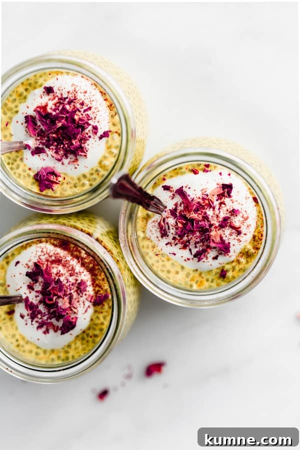 Turmeric Golden Milk Chia Pudding Recipe 4 a top down view of golden milk chia pudding topped with yogurt and rose petals