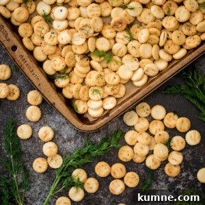 Ranch Dill Oyster Crackers Recipe for Party Snacks 10 Portion of a baking sheet showing seasoned oyster crackers.