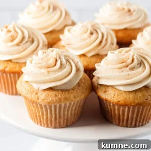 Sopapilla cupcakes on cake stand.