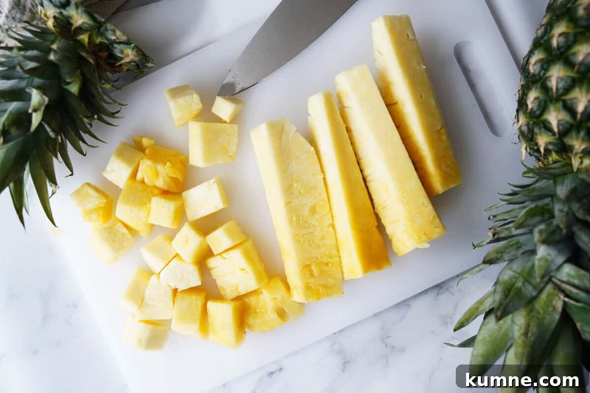 How to Tell When a Pineapple Is Ripe: 7 Signs to Look For 5 Pineapple Cut Up on white board
