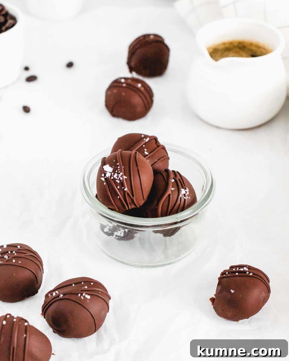 Mocha Chocolate Truffles Recipe: Rich Coffee-Infused Truffles 3 Mocha Chocolate Truffles topped with sea salt and a drizzle of chocolate