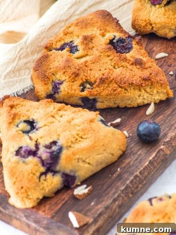 Almond flour blueberry scones on wooden board
