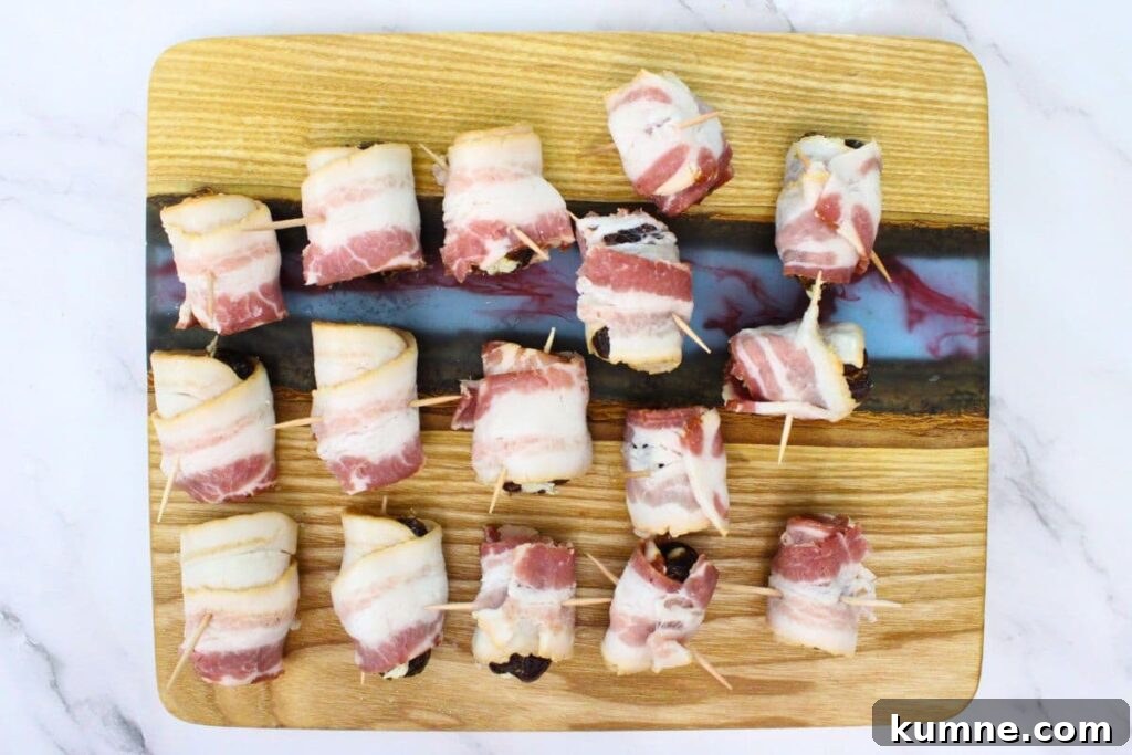 Crispy Air Fryer Bacon-Wrapped Dates Stuffed with Goat Cheese 6 carefully wrap bacon around stuffed date