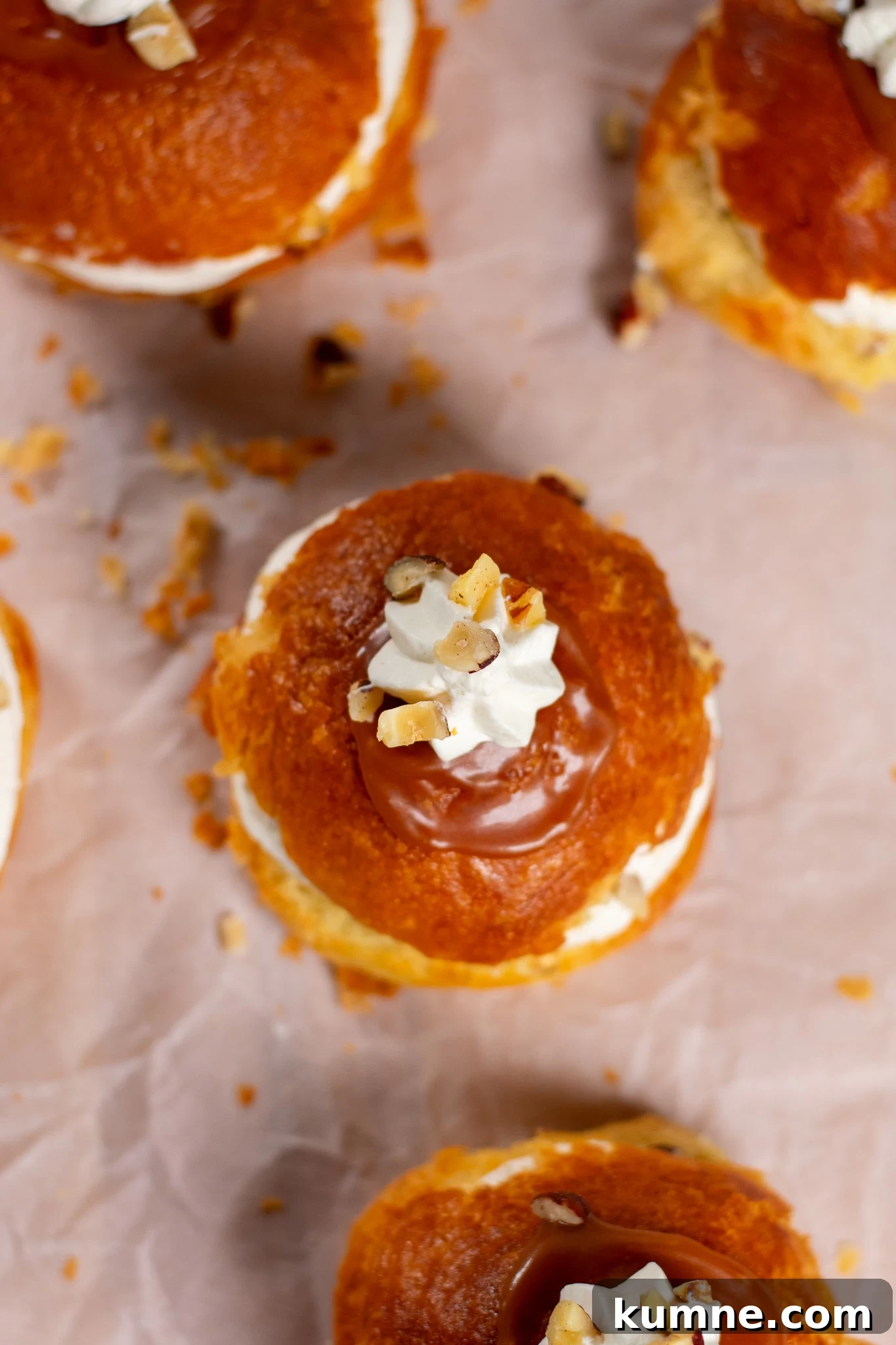 Salted Caramel Hazelnut Fastelavnsboller Recipe 8 Danish pastry buns filled with hazelnut, whipped cream, and salted caramel.