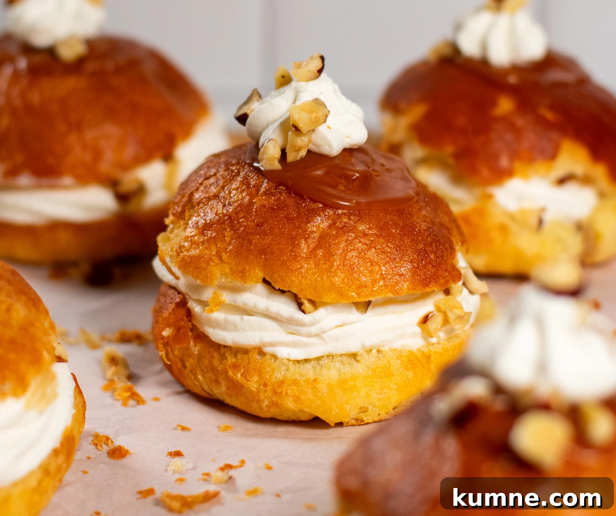 Salted Caramel Hazelnut Fastelavnsboller Recipe 10 Danish pastry buns filled with hazelnut, whipped cream, and salted caramel.