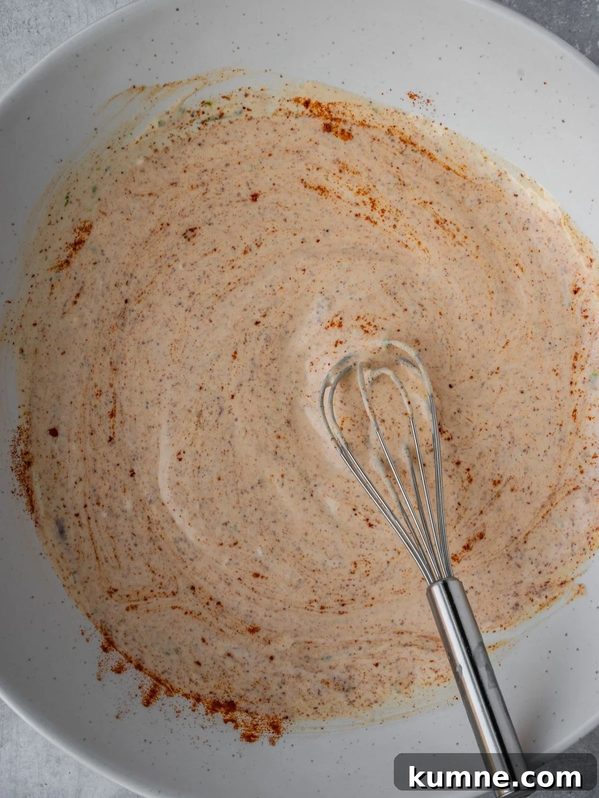 Elote Pasta Salad Inspired by Mexican Street Corn 6 Salad dressing getting whisked in a large serving bowl.