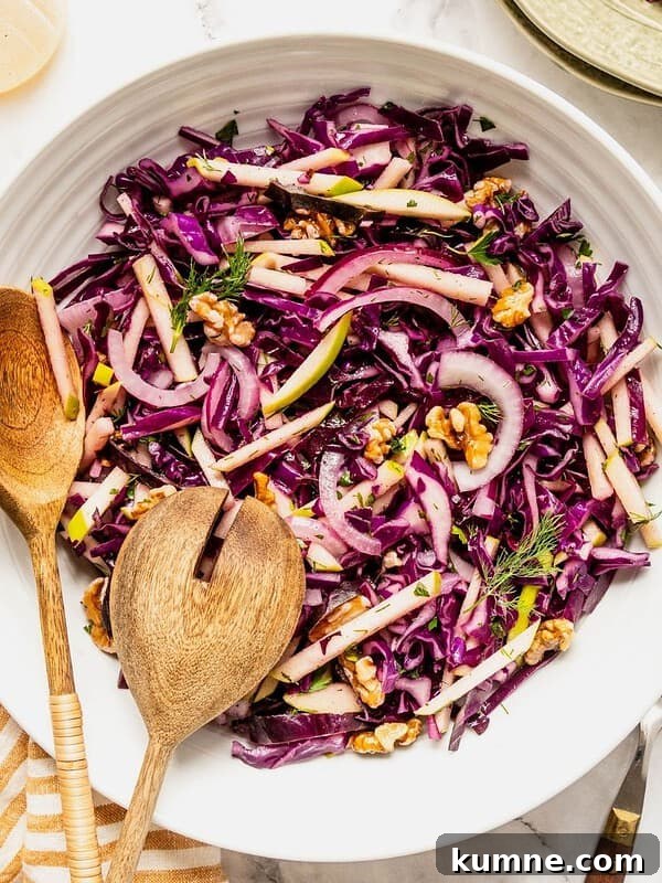 Elote Pasta Salad Inspired by Mexican Street Corn 10 Purple cabbage slaw with apples and walnuts in a bowl.
