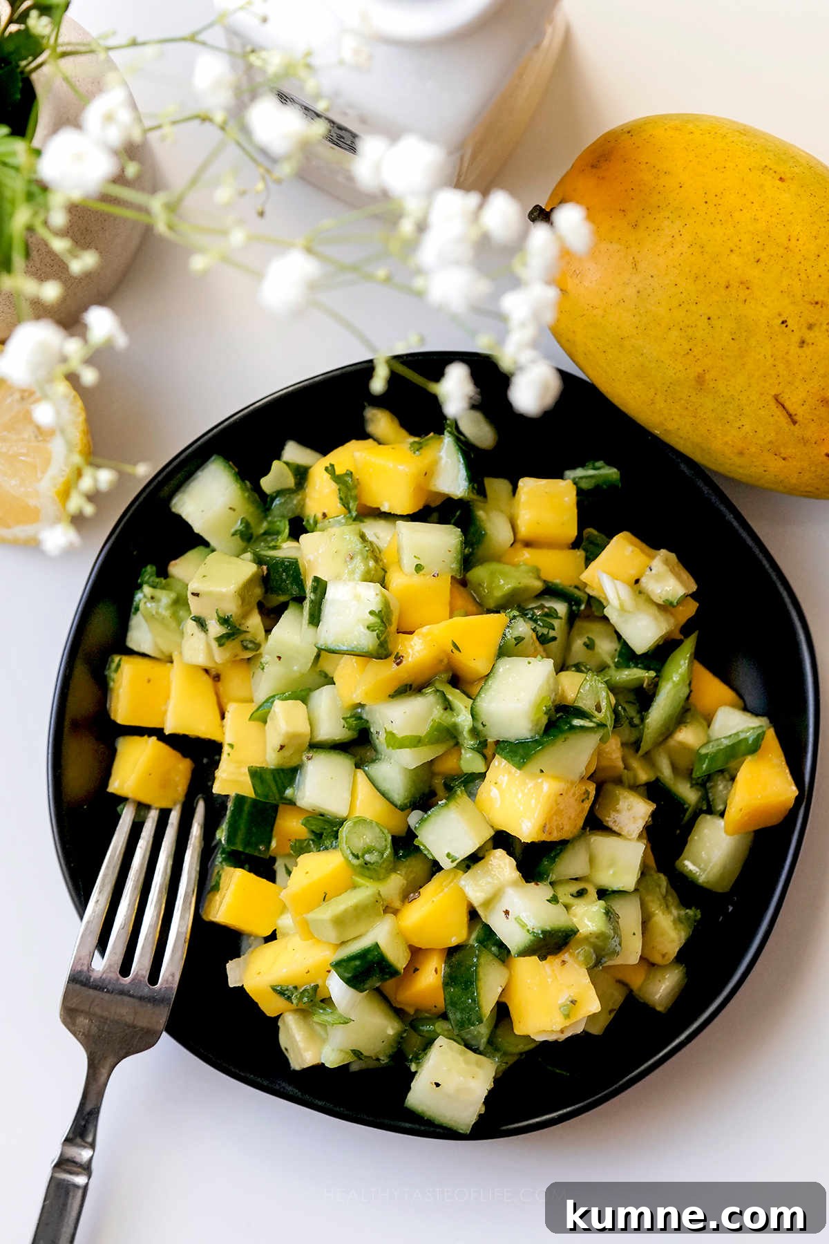 Cucumber, Mango & Avocado Salad with Lime Dressing 2 Mango cucumber salad served as a side dish.