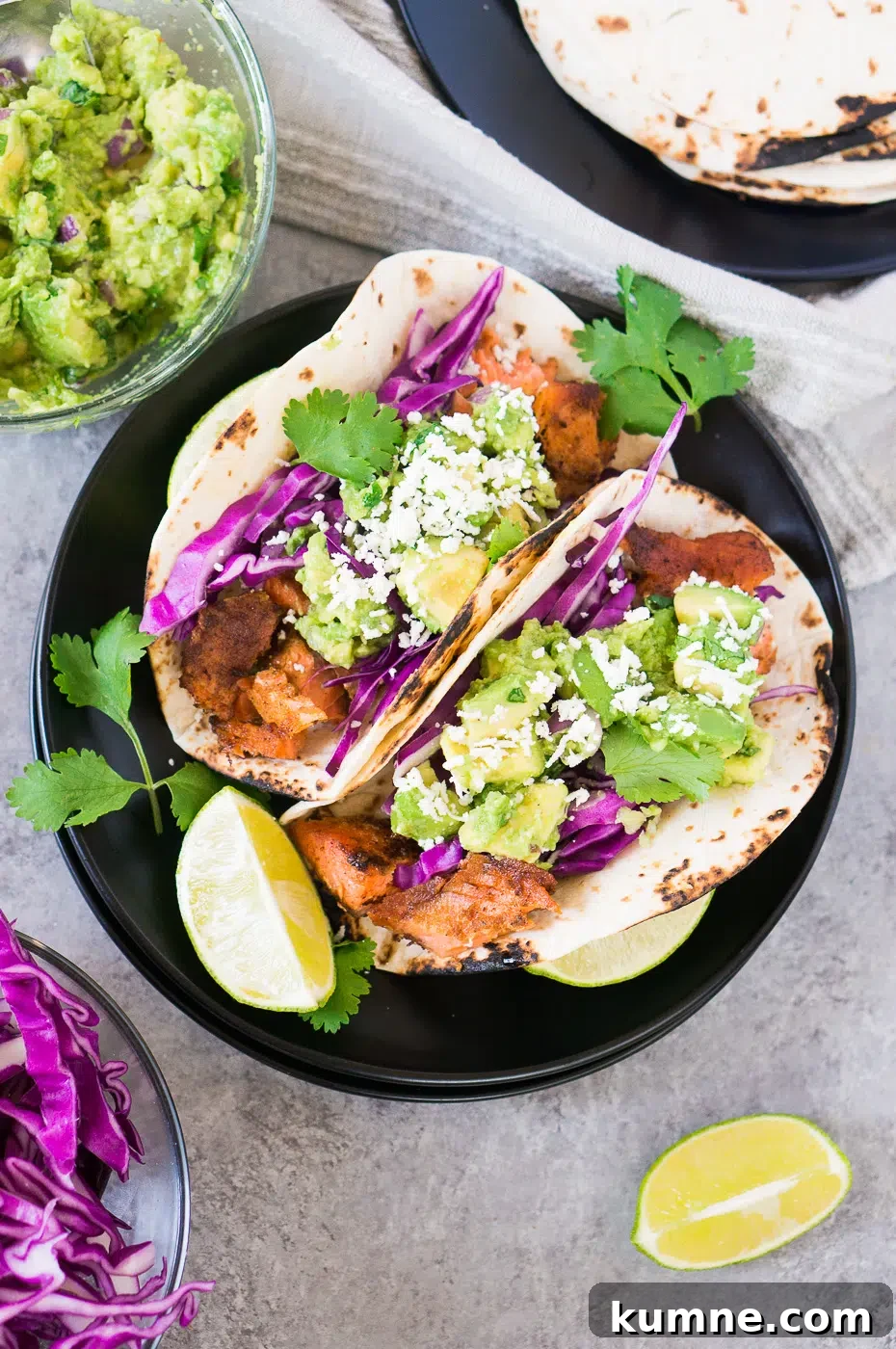 Citrus-Glazed Salmon Tacos with Avocado Slaw 2 salmon tacos recipe with avocado salsa and cabbage