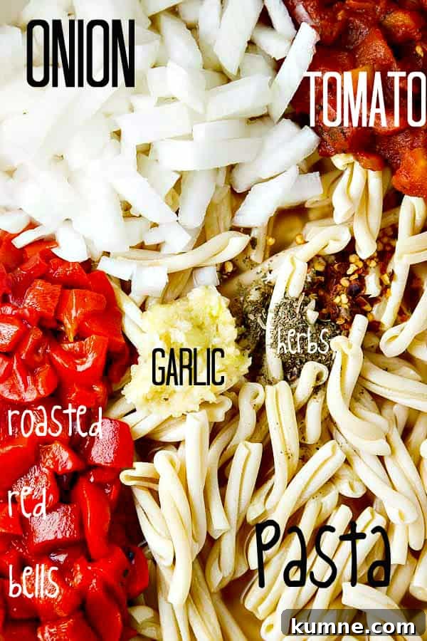 One Pot Pasta with Roasted Red Peppers, and a creamy Goat Cheese sauce! Just toss your ingredients into the pot with your UNCOOKED pasta and go!