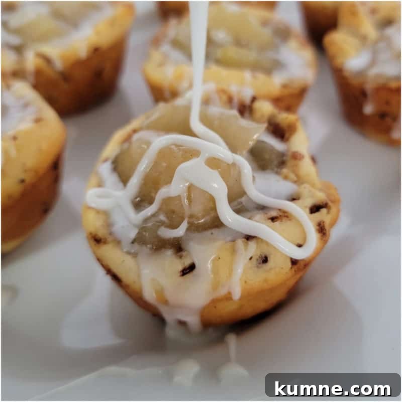 Top Fall Dessert Recipes You Need to Try This Season 28 Icing drizzling onto a 2 Ingredient Cinnamon Roll Apple Pie Cups