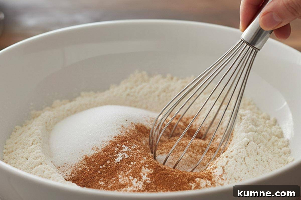 Maple-Glazed Apple Fritter Donut Holes Recipe 5 Whisking the flour, sweetener or sugar, baking powder, salt and cinnamon in a large bowl.