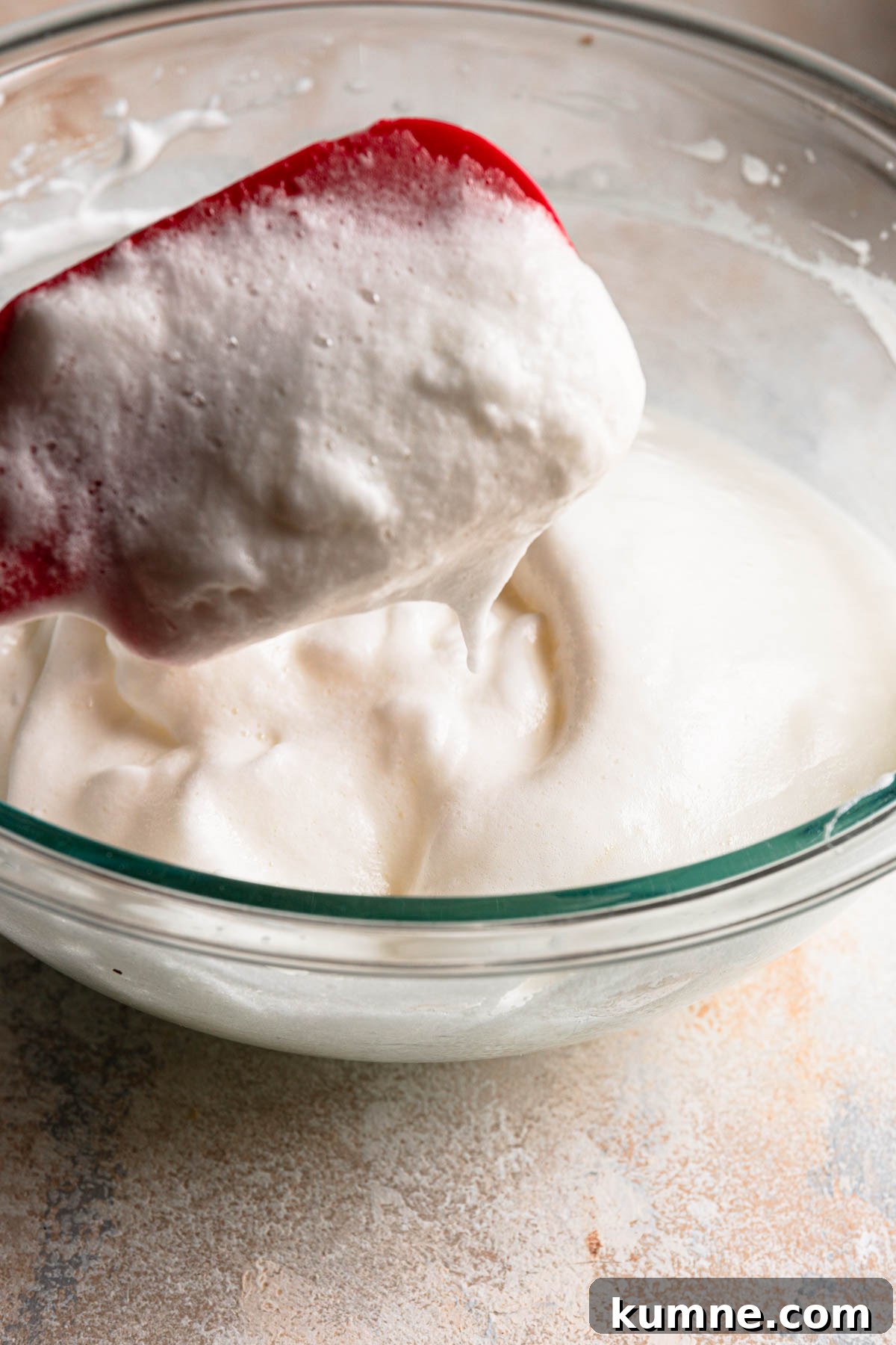 Light and Tender Passover Cake Recipe for a Perfect Seder 8 A spatula with medium stiff meringue.