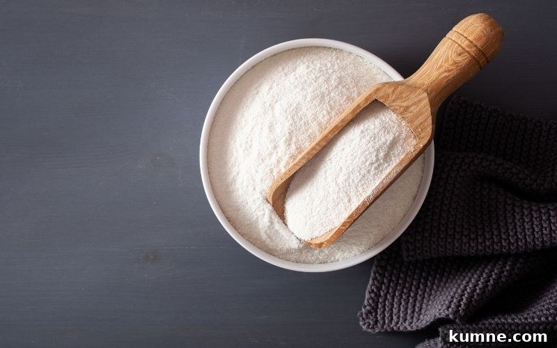 Coconut flour in a white bowl.