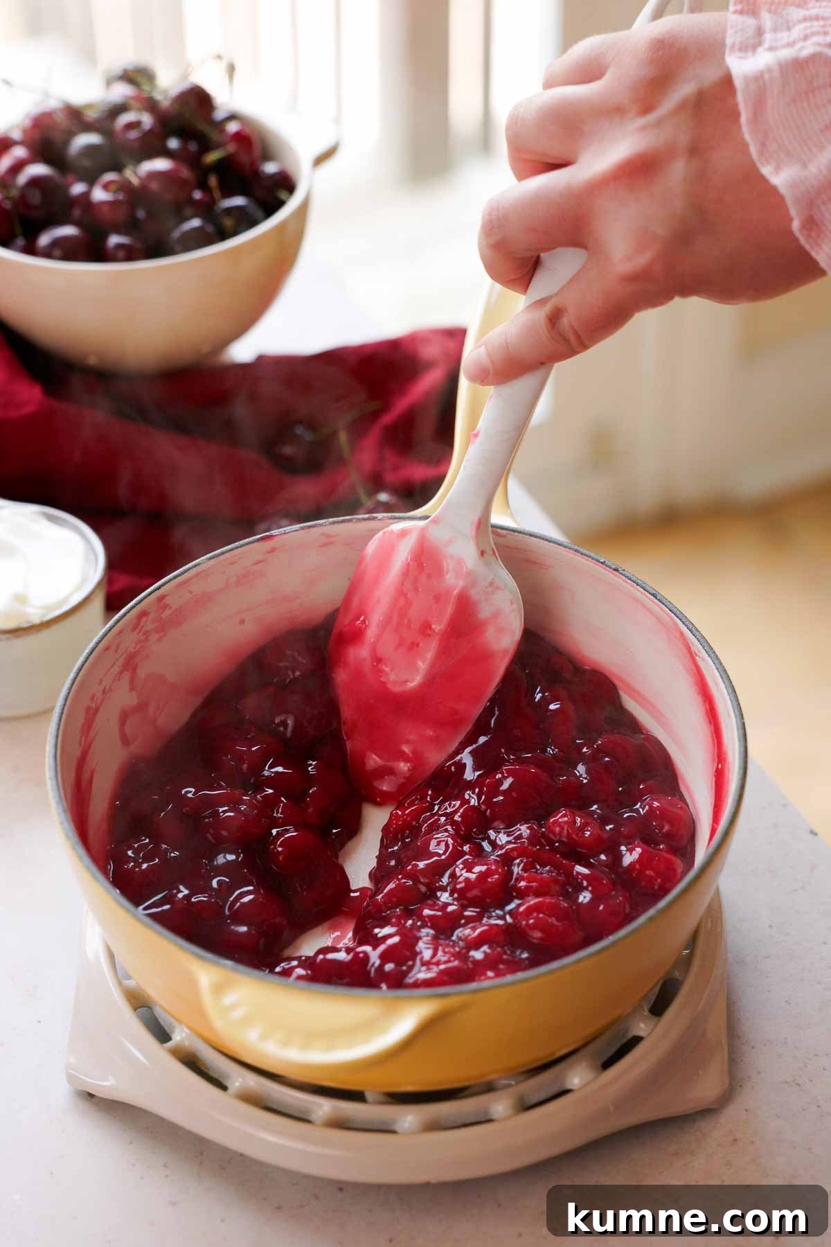 thickened tart cherry sauce in saucepan