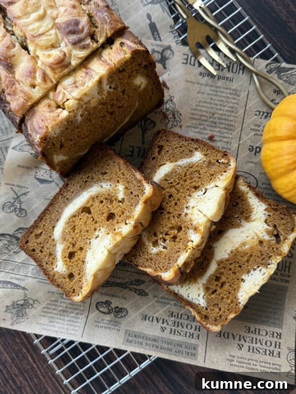 Homemade Pumpkin Spice Donuts Recipe for Fall Baking 4 Sliced pumpkin bread with creamy swirls