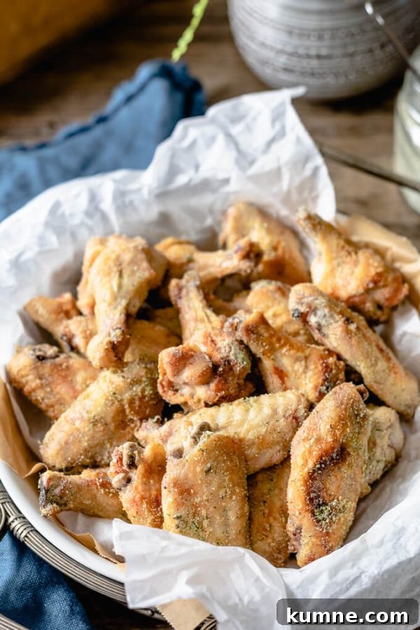 Tangy Ranch Chicken Wings bake in the oven and are out-of-this-world tasty. #ranchchicken #chickenwings #lowcarb #keto