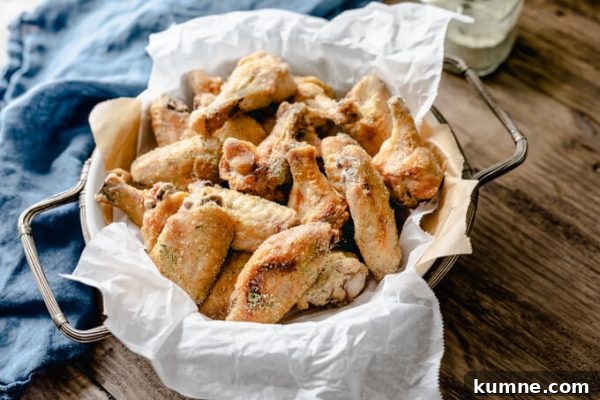 Tangy ranch chicken wings pieces in a basket.