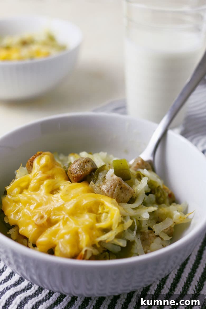 This chicken sausage hash brown breakfast bake is so easy to make that it only takes 5 steps! It's fast, hearty and the perfect addition to your weekday breakfast menus!