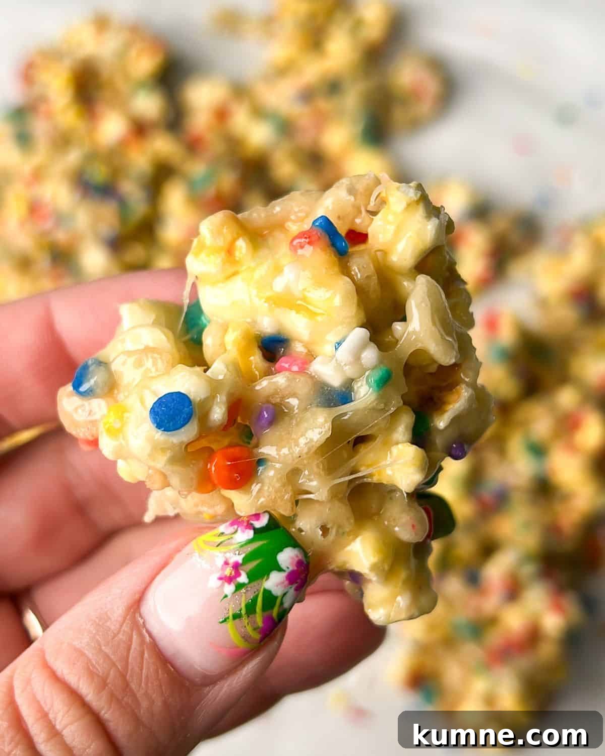 cake batter popcorn in hand
