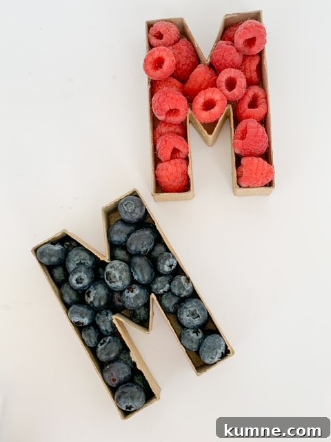 paper mache letters filled with fruit