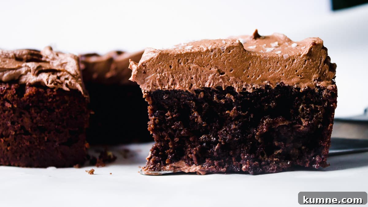 Close up of mini chocolate cake with a slice cut out