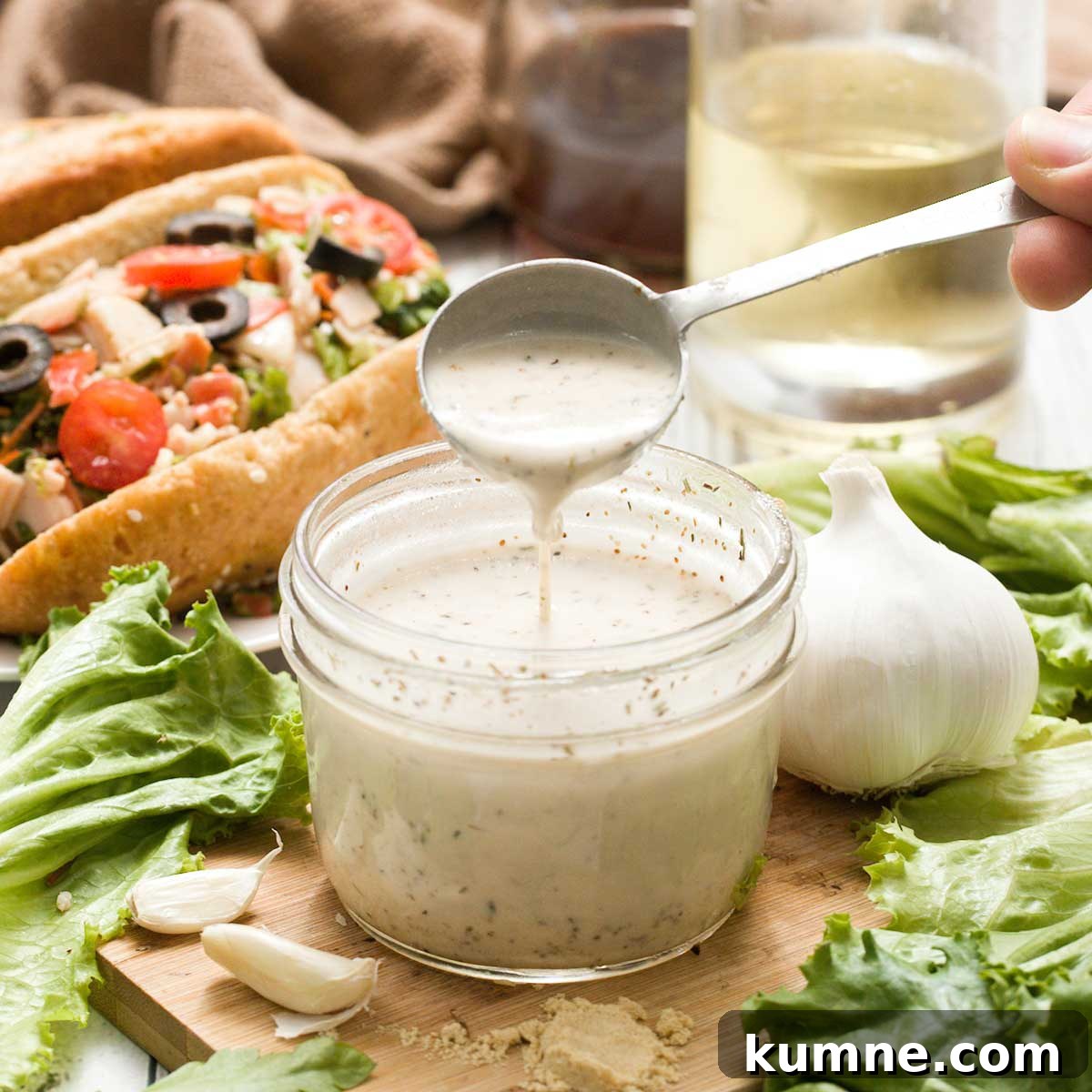 Olive Garden Creamy Italian Dressing Copycat Recipe — Quick Guide 2 Jar of creamy Italian salad dressing in a mason jar.