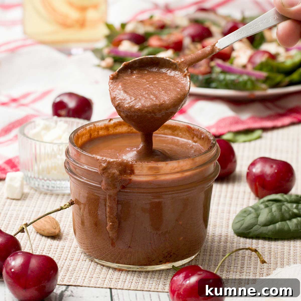 Olive Garden Creamy Italian Dressing Copycat Recipe — Quick Guide 11 A spoon full of cherry balsamic vinaigrette with fresh cherries.