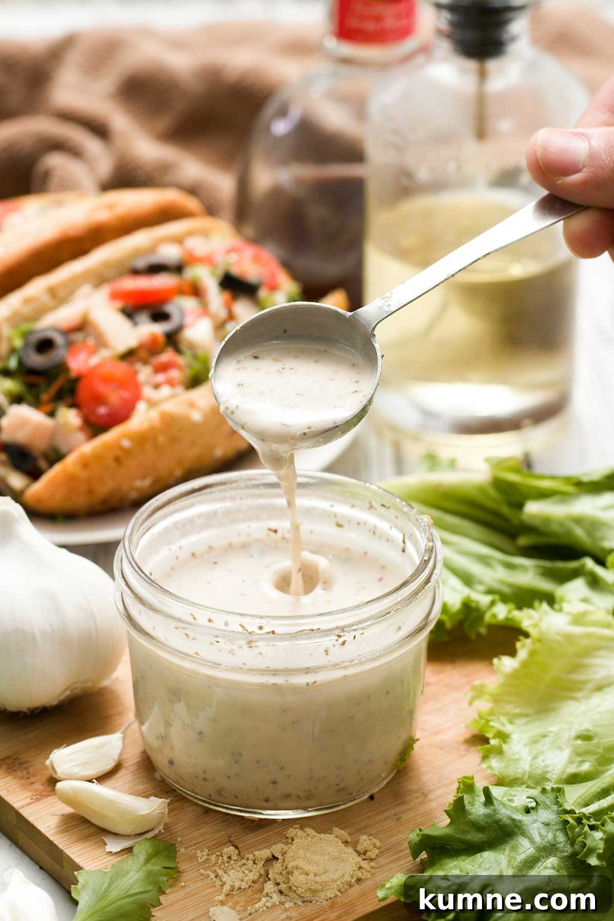 Olive Garden Creamy Italian Dressing Copycat Recipe — Quick Guide 3 Jar of creamy Italian salad dressing in a mason jar.