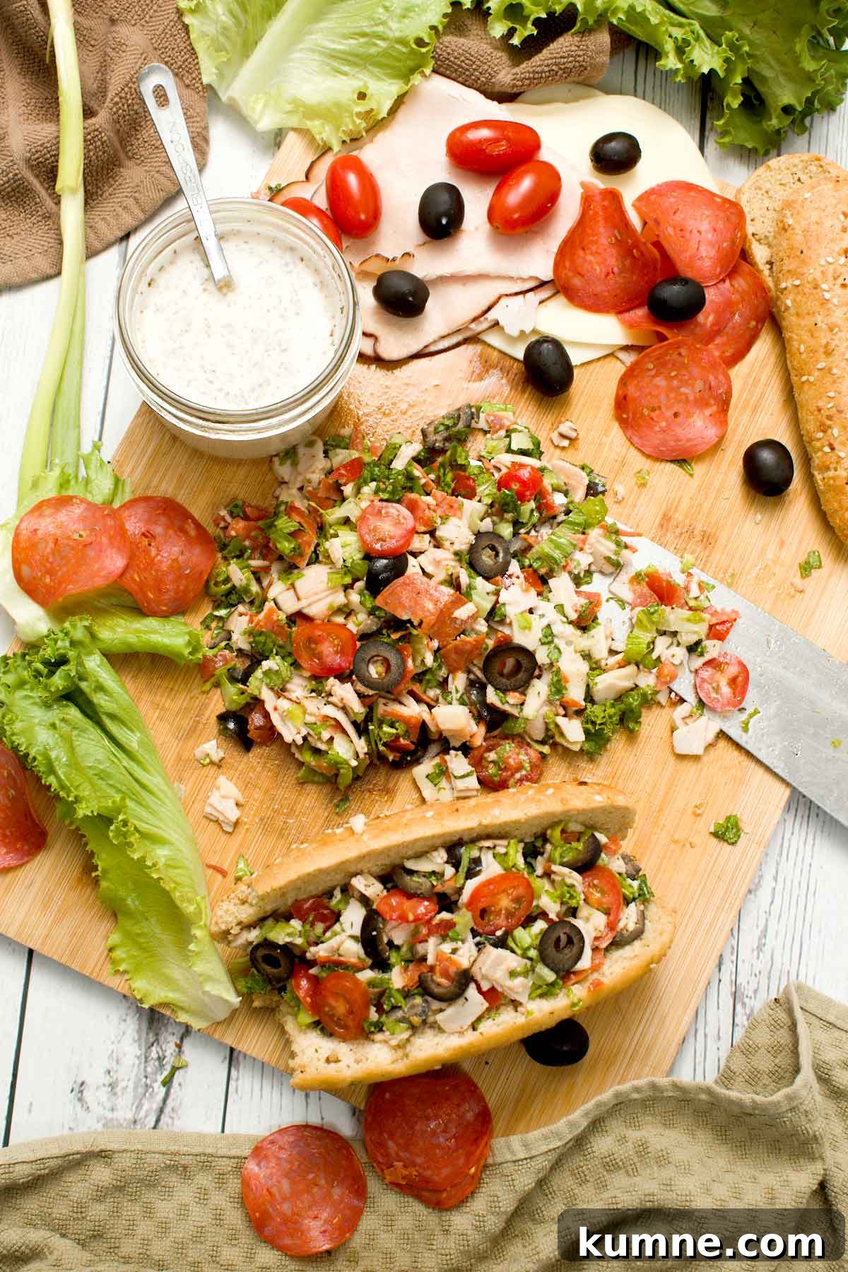 Olive Garden Creamy Italian Dressing Copycat Recipe — Quick Guide 4 Two chopped Italian sandwiches on a plate.