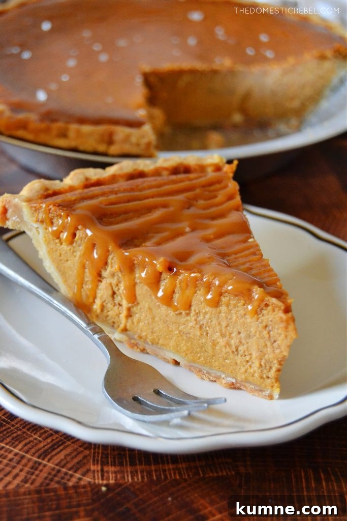 Salted Caramel Pumpkin Pie Recipe for Fall Desserts 5 slice of salted caramel pumpkin pie on a white plate with a fork