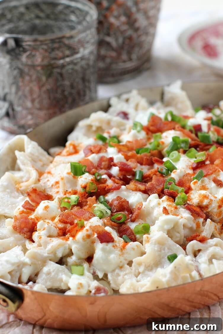Túrós Csusza Recipe: Traditional Hungarian Cottage Cheese Pasta 2 copper dish of Turos Csusza