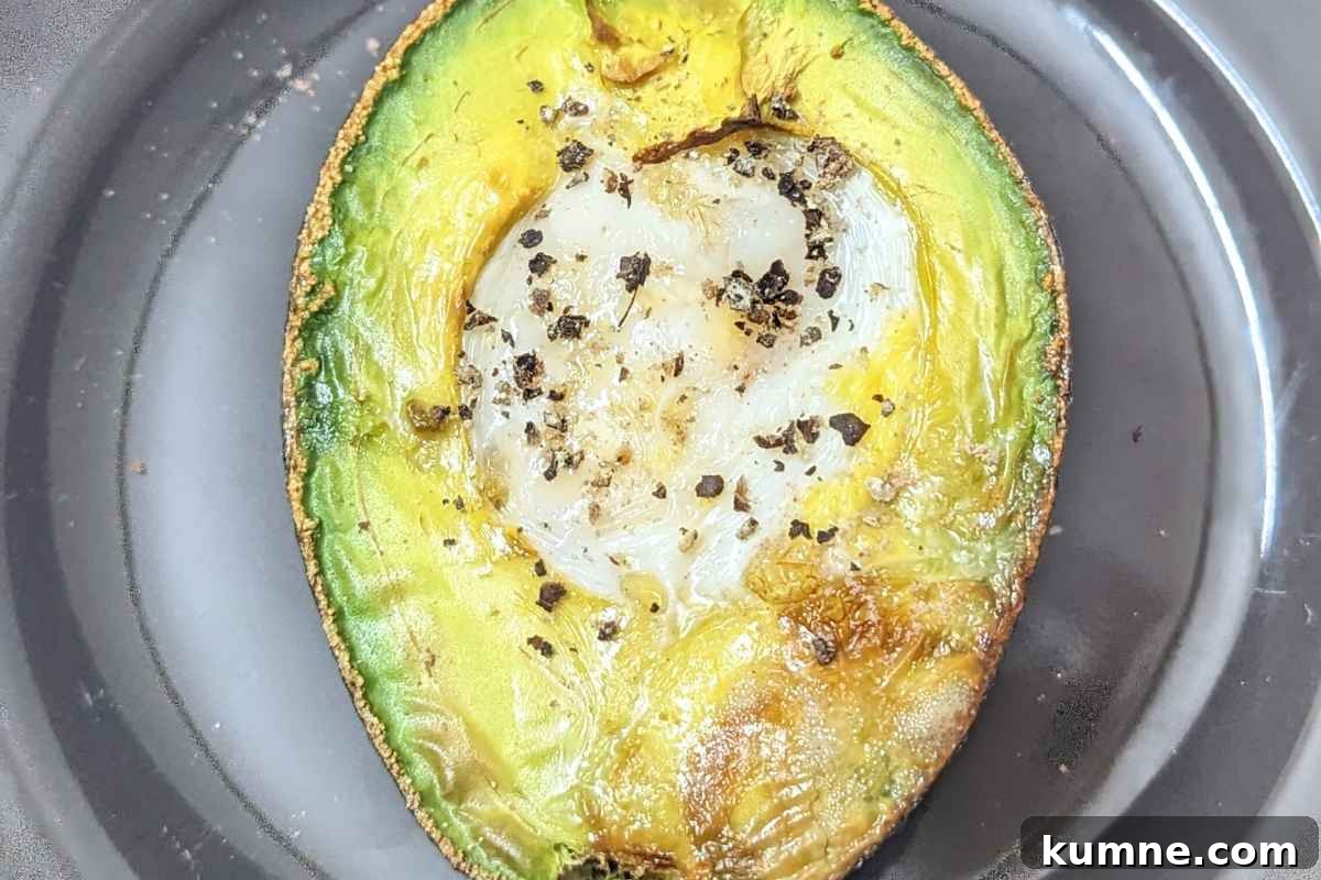 10 Air Fryer Egg Recipes to Transform Your Breakfast Routine 10 Avocado egg on a plate