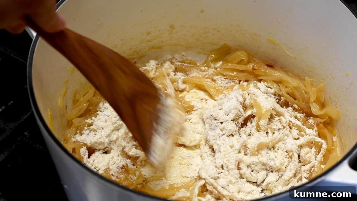 stirring flour into caramelized onions